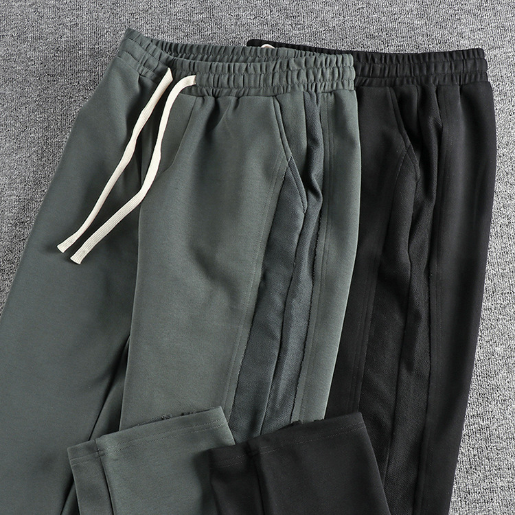 GorgeousBen  Men's Side splicing design with a trendy and youthful straight-leg casual pants for men, featuring American style and versatile wide-leg slit trousers.