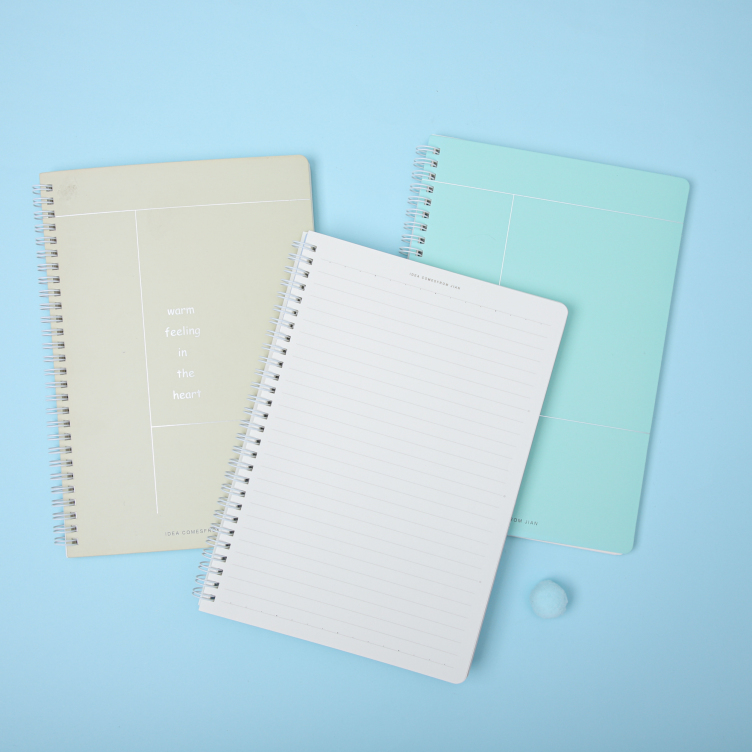 Sprial bound notebook with foil printing on white card cover