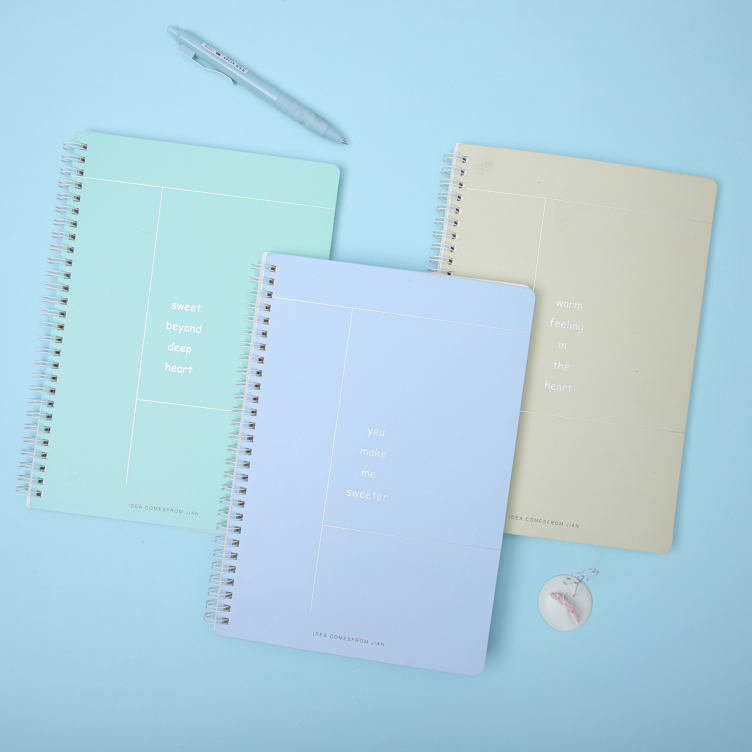 Sprial bound notebook with foil printing on white card cover