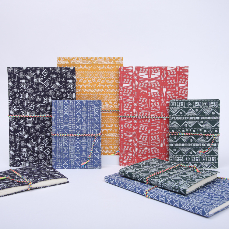 Fabric softcover notebook with string closure