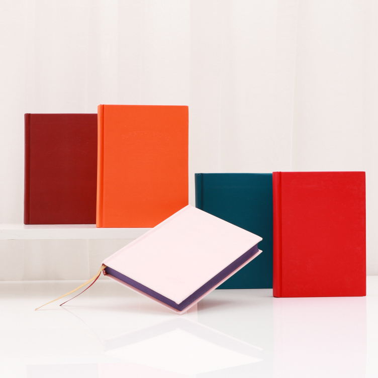 Embossed hard cover case bound notebook
