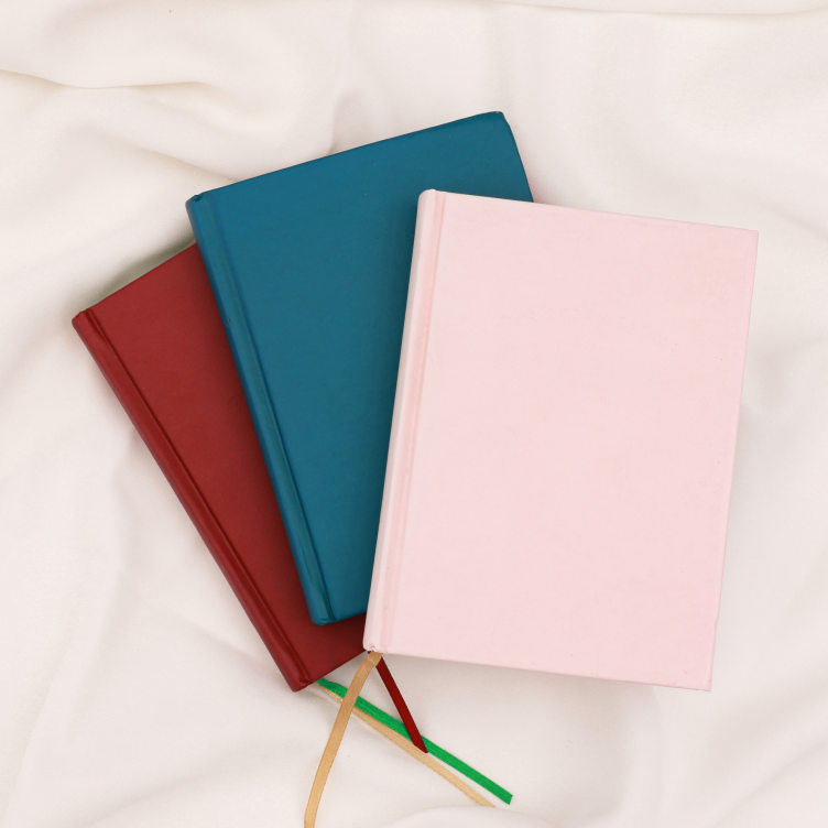 Embossed hard cover case bound notebook