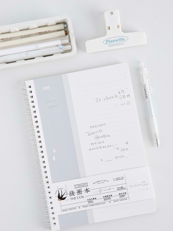 Sprial bound notebook with foil printing on white card cover