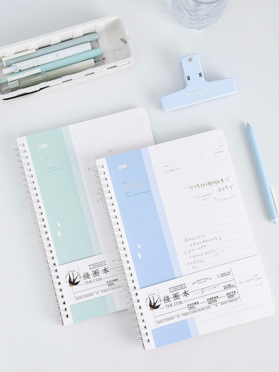 Sprial bound notebook with foil printing on white card cover