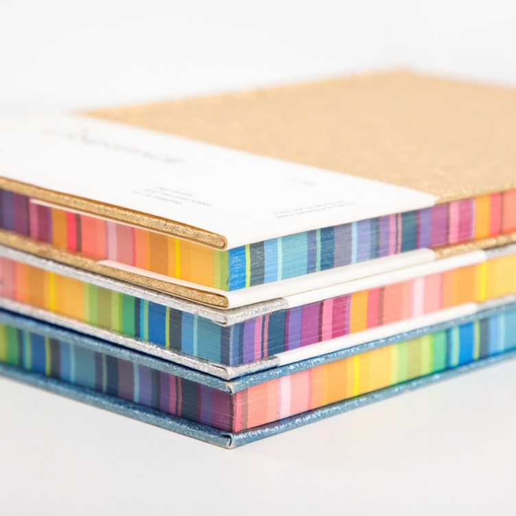 Hardcover casebound notebook with rainbow print on side edges