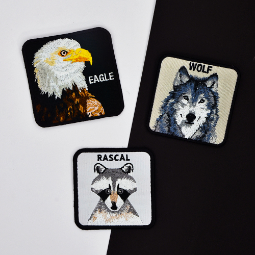 Embroidered pins, custom pins can be added in 2 colors for free