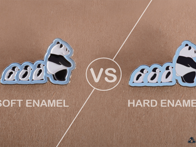 What is the difference between a soft enamel coin and a hard enamel coin?