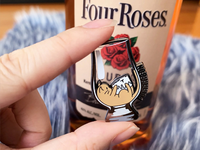 How do you determine the price of enamel pins?