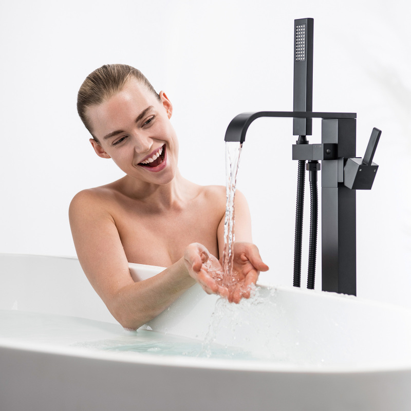W123247696 Single-Handle Freestanding Floor Mount Roman Tub Faucet Bathtub Filler with Hand Shower in Matte Black