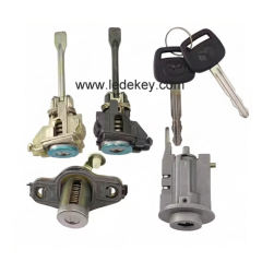 Full locks for older Toyota Corolla models, including ignition locks, driver's door locks, and trunk lock cylinders