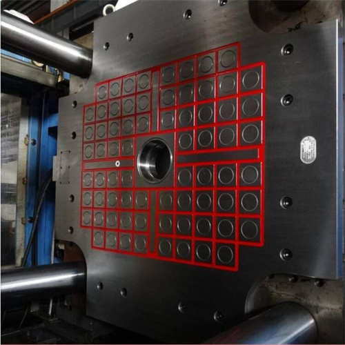 Quick-change electronically controlled permanent magnet chuck for injection molding machine