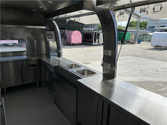 Gourmet Donuts & Cold Brew | Blue Airstream Food Truck