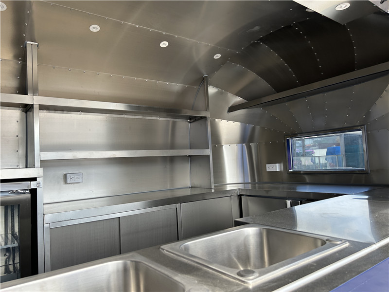 Gourmet Donuts & Cold Brew | Blue Airstream Food Truck