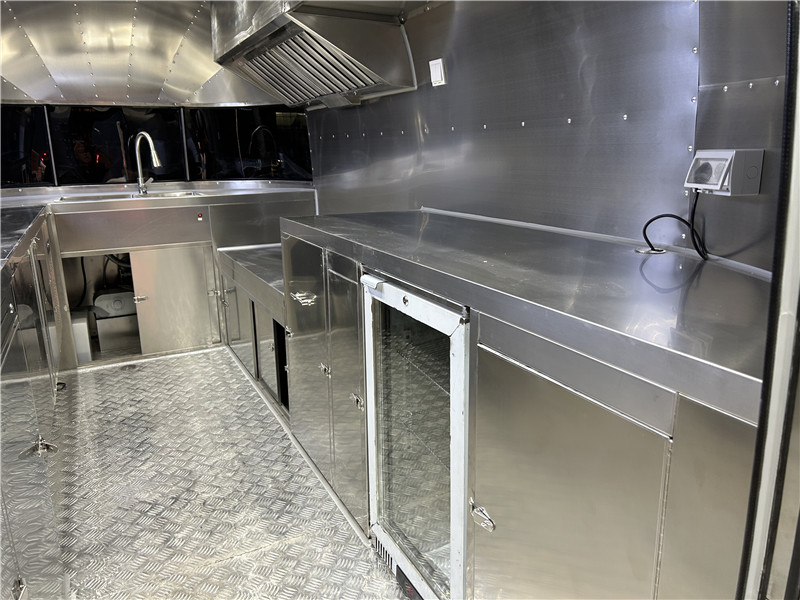 The Silver Airstream Coffee Trailer Nashville Hot Chicken Sandwich Food Truck