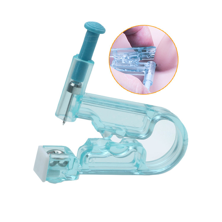 Disposable ear piercing gun