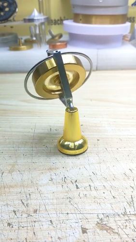 Angular momentum gyroscope rotates and tilts at an angle without falling #CNC machining #machining