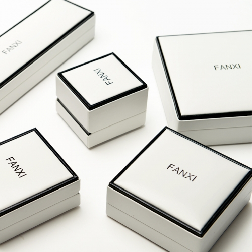 FANXI Custom Logo Luxury White PU Packaging Boxes With Black Edge And Velvet Insert For Ring Necklace Bracelet Leather Jewellery Box