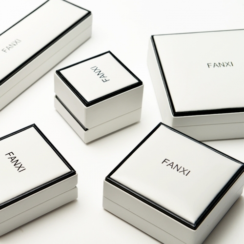 FANXI Custom Logo Luxury White PU Packaging Boxes With Black Edge And Velvet Insert For Ring Necklace Bracelet Leather Jewellery Box