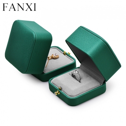 Emerald green leather jewelry packaging box with gray microfiber inside