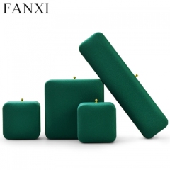 Emerald green leather jewelry packaging box with gray microfiber inside
