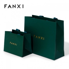 Dark green paper jewelry bag with matching ribbon