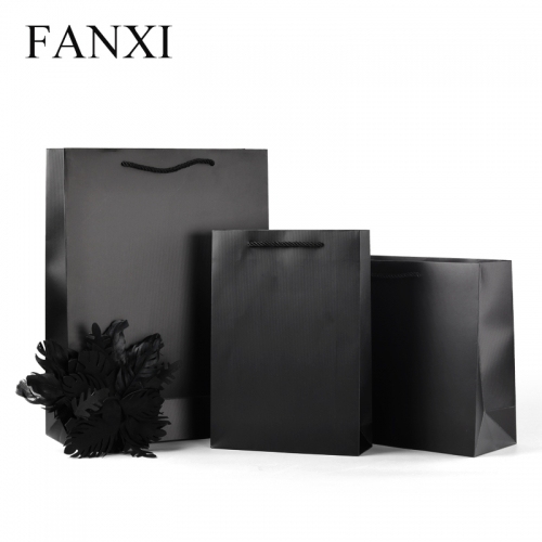 FANXI factory wholesale custom famous brand black paper bag with logo printed