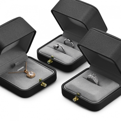 Octagon black leather jewelry packaging box with gray microfiber inside.
