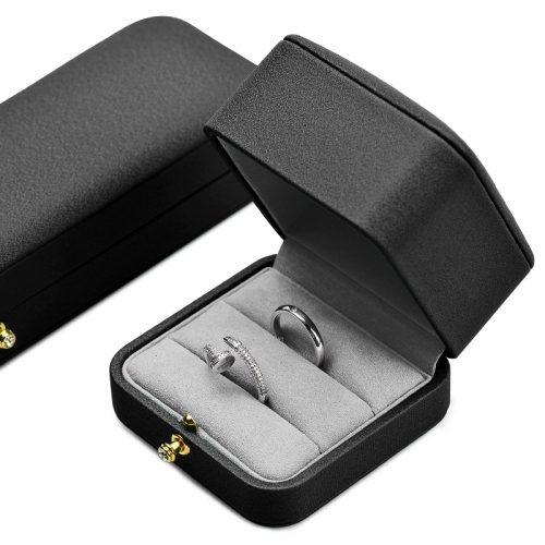 Octagon black leather jewelry packaging box with gray microfiber inside.