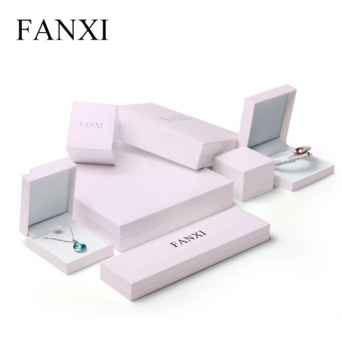 Pink jewelry packaging box with white velvet inside