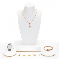 Luxury white jewellery display set with gold metal