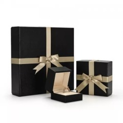 Black leather jewelry packaging with bowknot