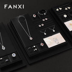 FANXI hot sale Black PU leather Jewelry display set series Product parameters Synopsis Name: Jewelry display set series Number: TT322 Material: PU leather Color: Black