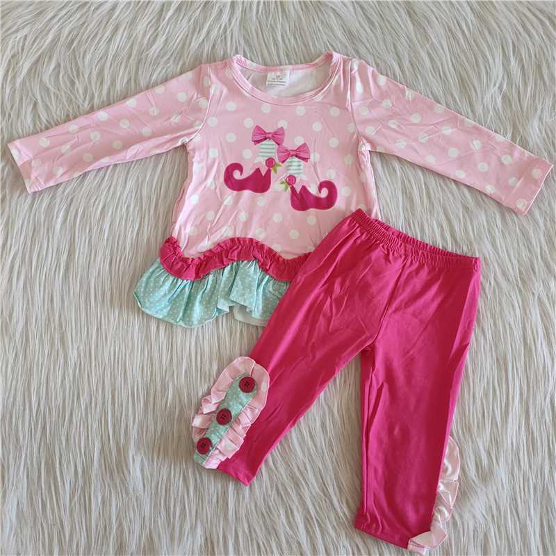 Pink polka dot shoes and red pants suit