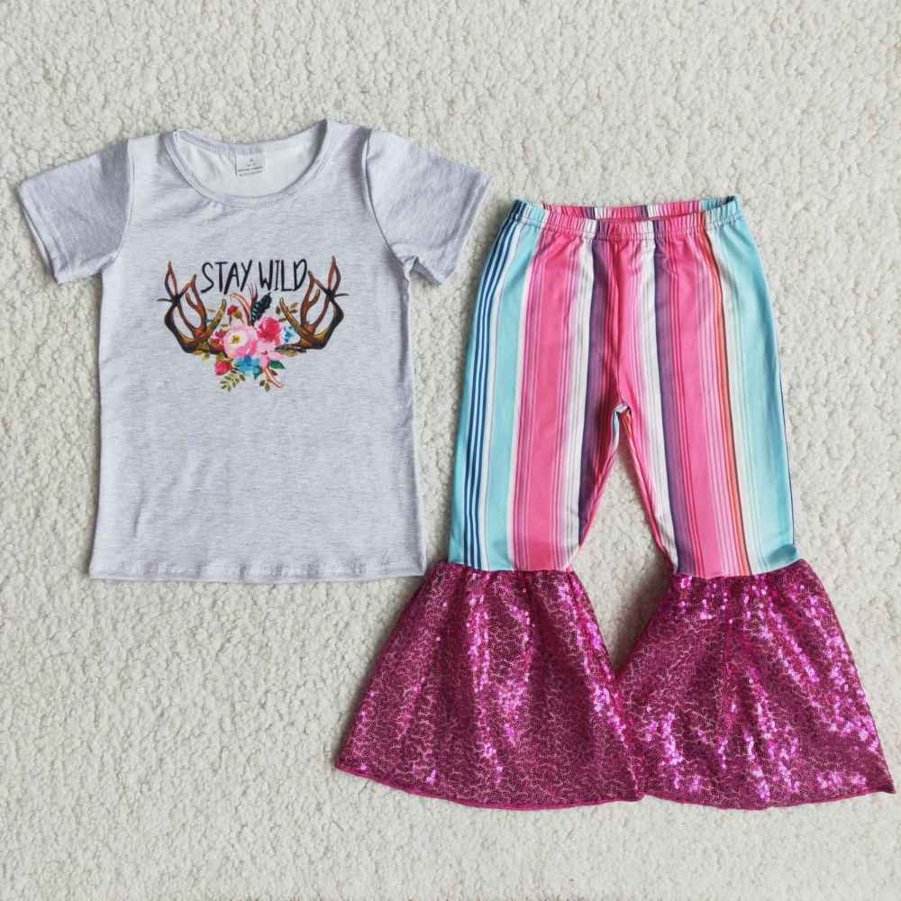 white top bell bottom sequin pants outfit