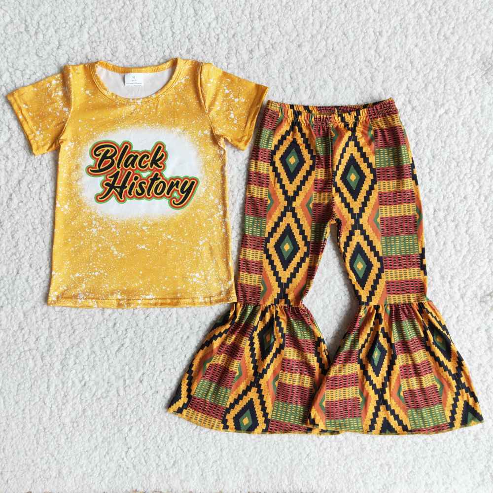 yellow black history pattern bell bottom sequin pants outfit