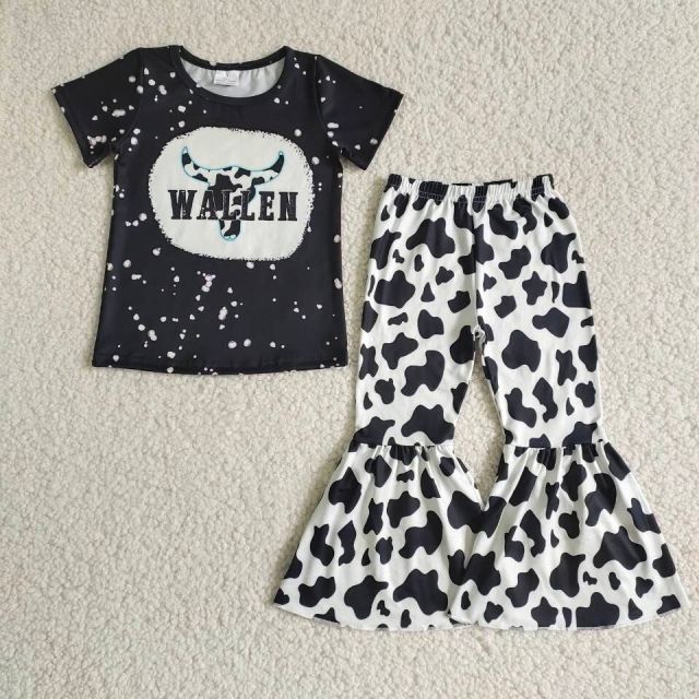 black cow print short sleeve pants outfit