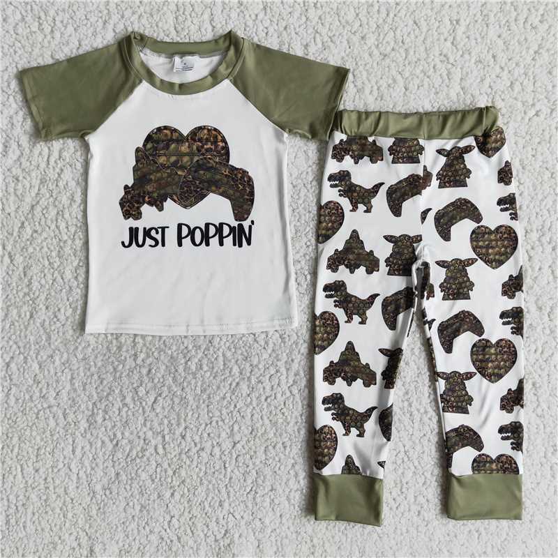 E12- 16 boy white green dinosaurs short sleeve black pants Set