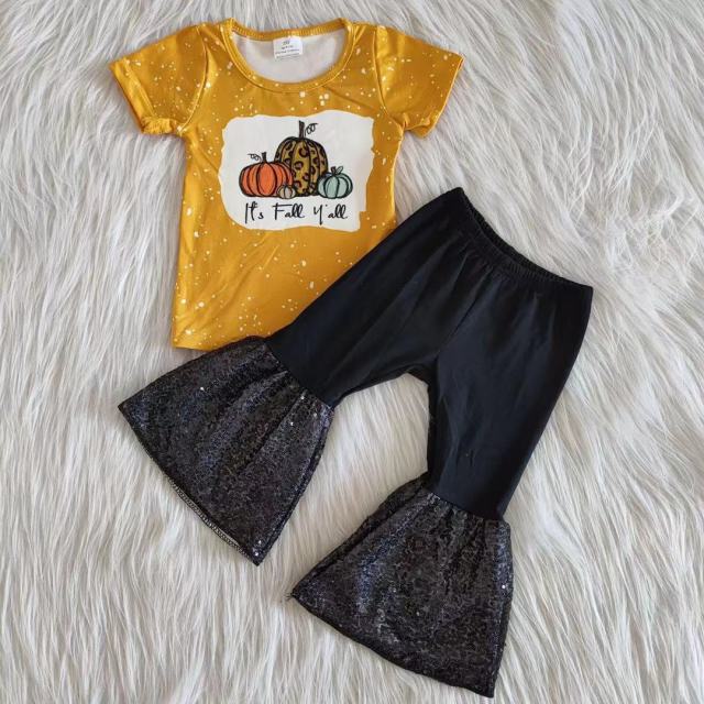 A2-12 Pumpkin yellow short-sleeved top and black sequined pants