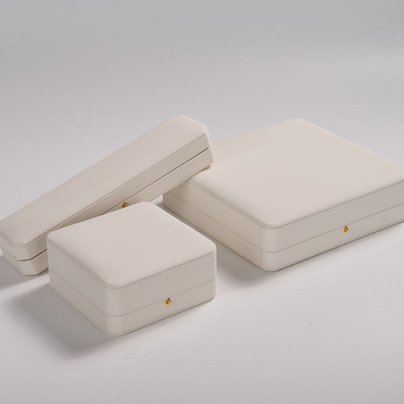 hot sale luxury white pu leather and microfiber jewelry box set hold ring necklace bangle pendant with metal button