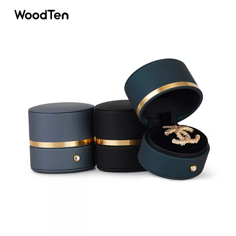 Custom Logo Wholesale New Arrival PU leather jewellery box with golden button ring earrings necklace package oval shape jewelry boxes