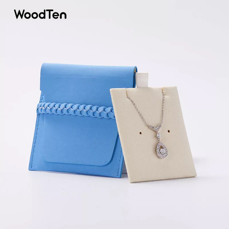 Hot sale custom blue pu leather jewelry pouch with insert for earring pendant package with custom logo