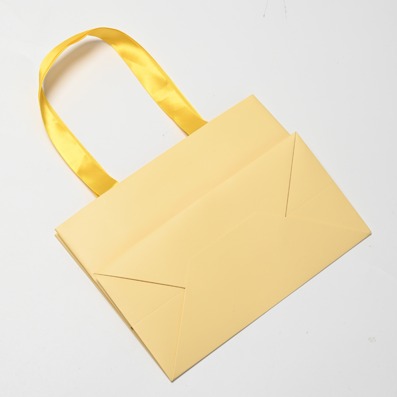 Hot Sale Yellow Packaging Gift Paper Bag with Your Own Logo