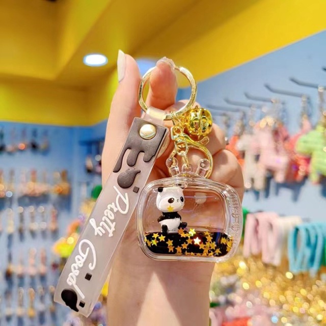 Transparent black oil floating panda keychain female cute fashion exquisite bag hanging decoration car key chain pendant