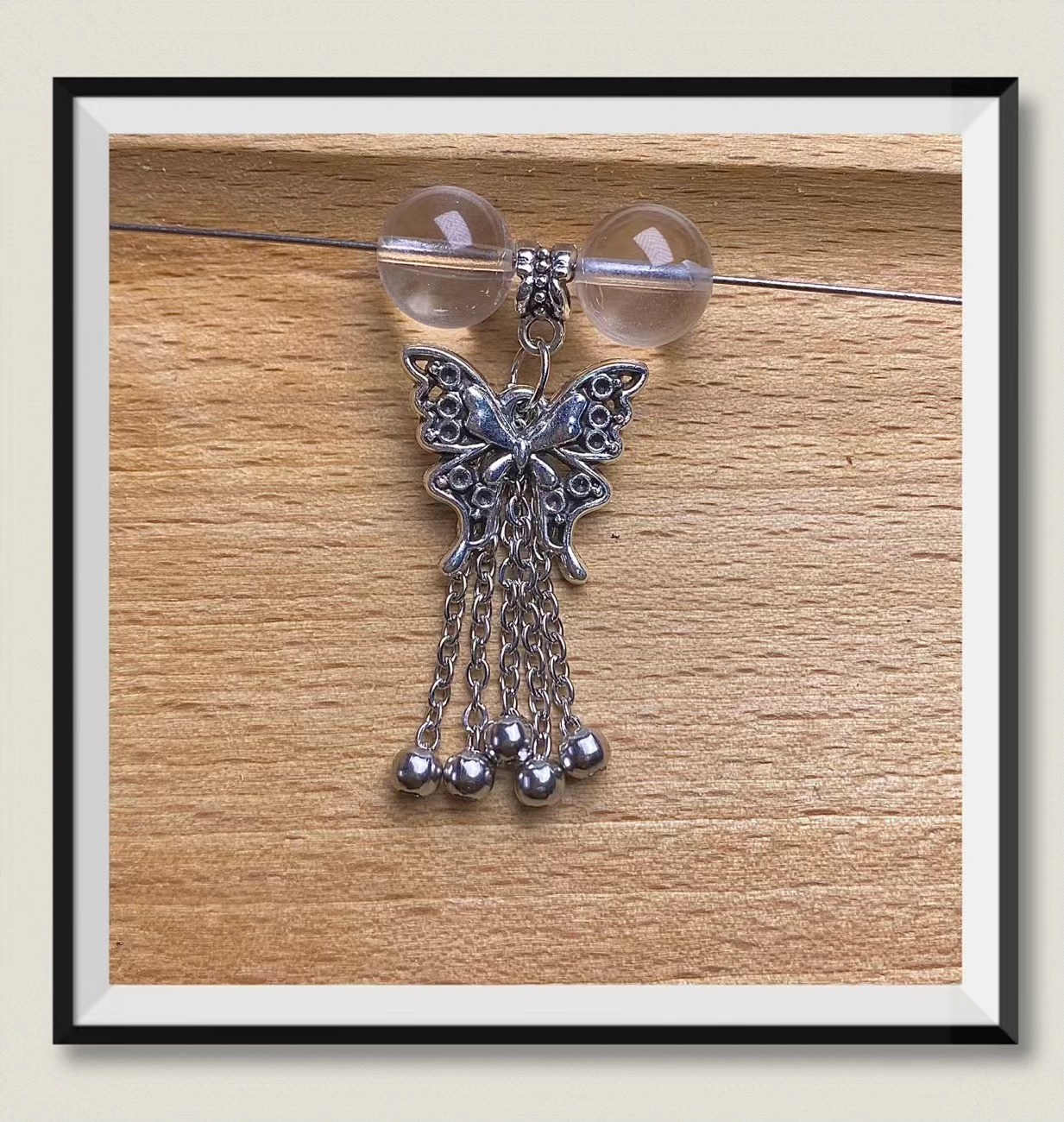 The new retro silver is the same as the old butterfly tassel crystal DIY copper accessories