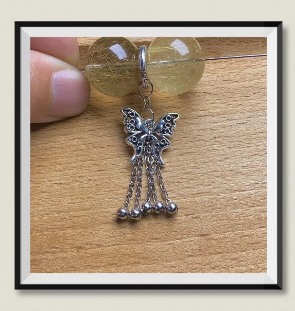 The new retro silver is the same as the old butterfly tassel crystal DIY copper accessories