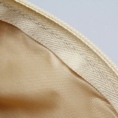 Cosmetic bag with wood grain pattern