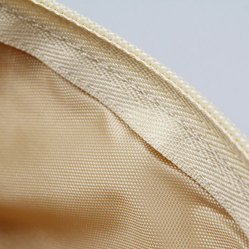 Cosmetic bag with wood grain pattern