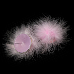 202400061--Feather breast patch, loose shot of adult products, clothing, props, chest patch