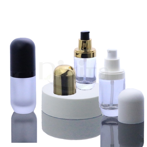 Fancy custom logo 30ml 1oz 40ml round clear glass cosmetic essential oil bottle with cream pump