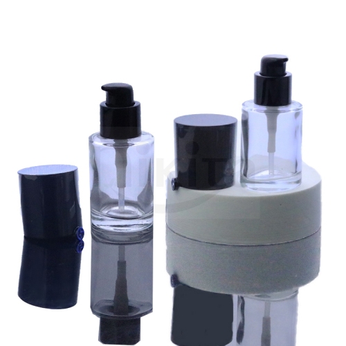 Wholesale custom empty 30ml 1oz round clear glass cosmetic serum toner bottle with black cream pump dispenser